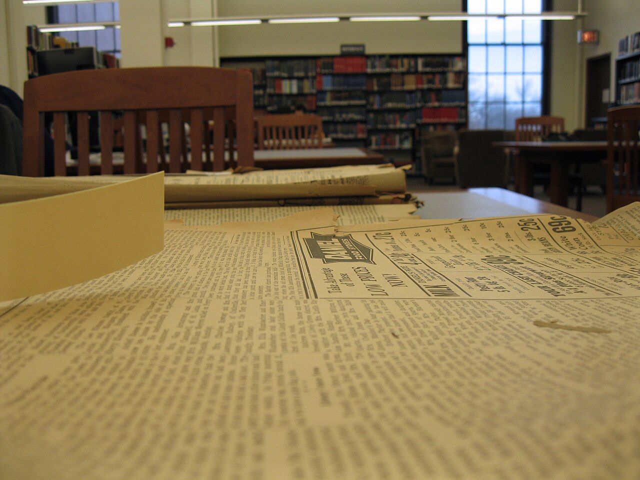 Stack of old newspapers in the History Philosophy and Newspaper Library.